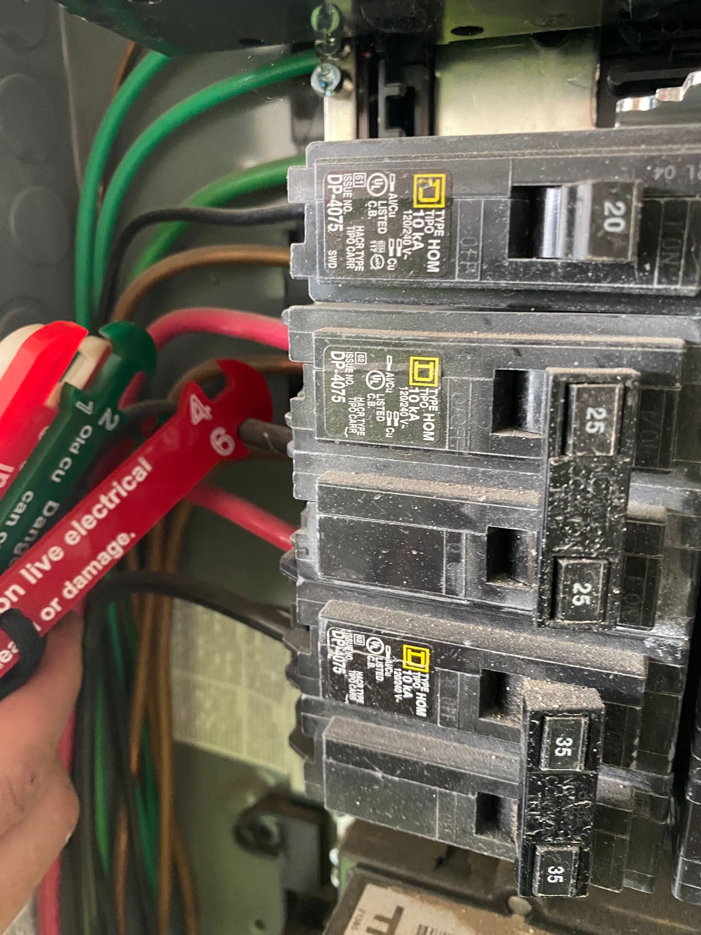 An electrical panel tested during a home maintenance inspection.