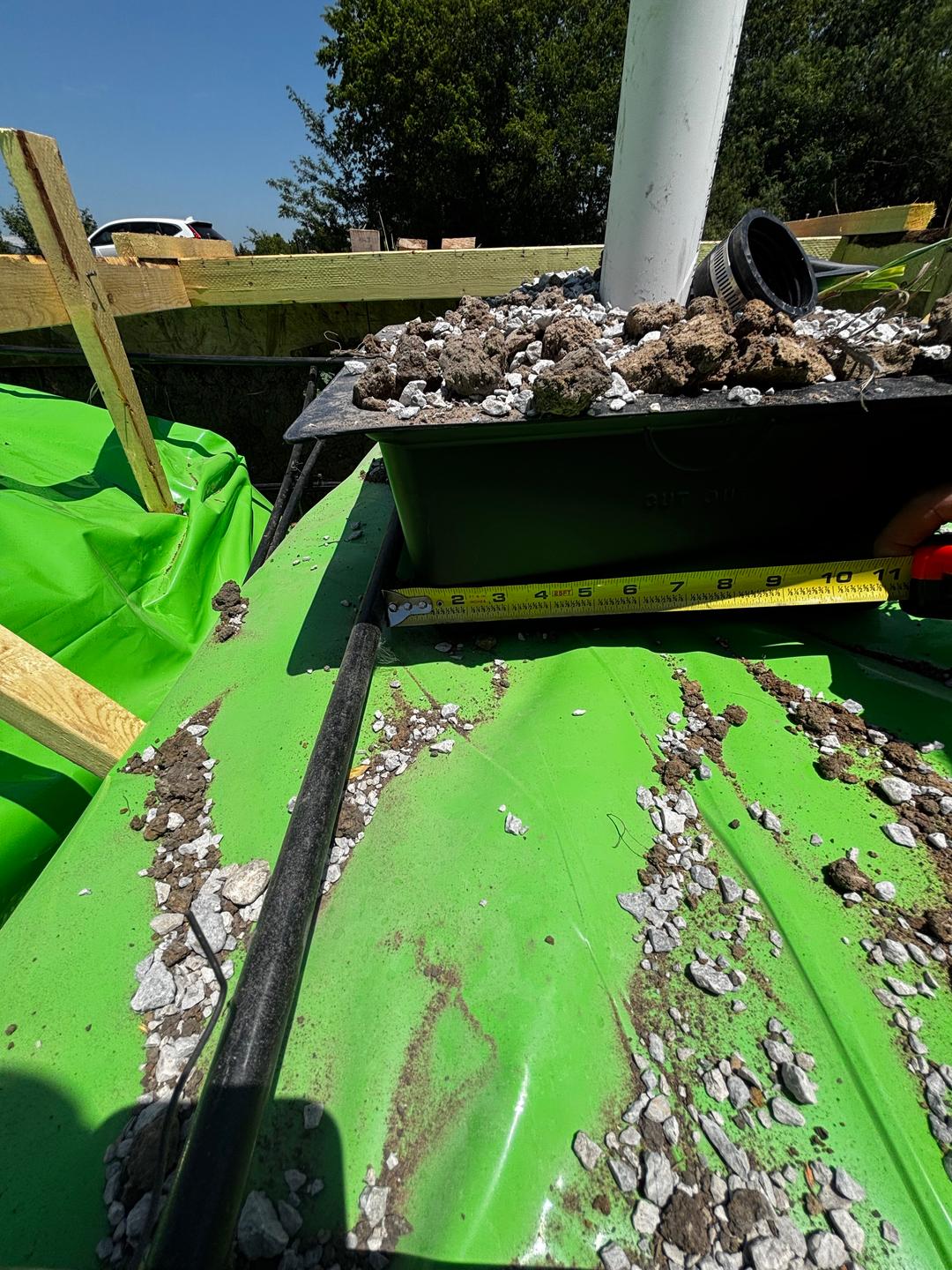 Post-tension cable spacing measured against the engineered plan during a pre-pour phase inspection.