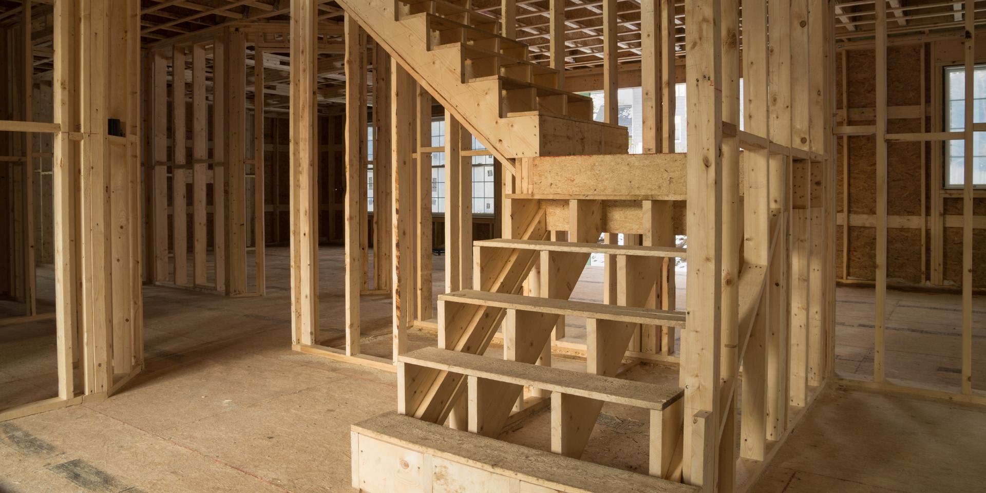 Open wall and staircase framing inside a new construction home during a phase inspection in Aubrey, TX.