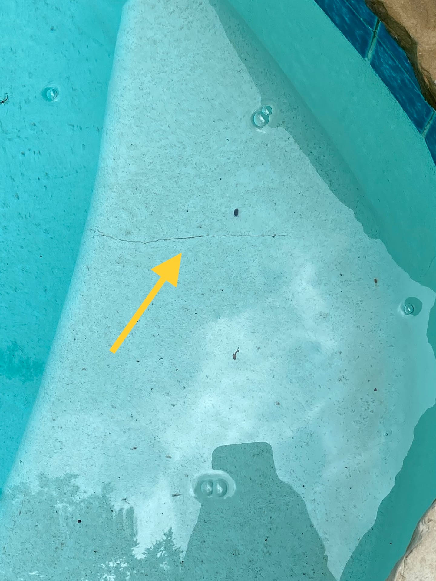 A crack found during a pool inspection add-on service.